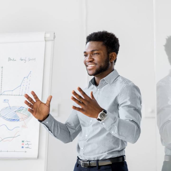 A man presenting at a flipchart